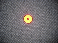 Reflector oranje rond 60 mm met plak laag